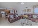 Relaxing living room with leather sofas and ocean view at 2967 S Atlantic Ave # 1706, Daytona Beach, FL 32118