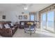Living room features ocean view and sliding glass doors at 2967 S Atlantic Ave # 1706, Daytona Beach, FL 32118