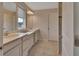 Bathroom boasts dual vanities and a large shower at 3009 Lake Tahoe St, Deland, FL 32724