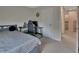 Bright bedroom with a bed, desk, and chair at 3009 Lake Tahoe St, Deland, FL 32724