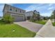 Two story house with driveway and landscaping at 3009 Lake Tahoe St, Deland, FL 32724
