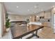 Open kitchen features modern cabinetry, granite countertops, and stainless steel appliances at 3009 Lake Tahoe St, Deland, FL 32724