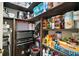 Walk-in pantry with abundant shelving for storage and organization at 30215 Tavares Ridge Blvd # 11, Tavares, FL 32778
