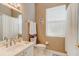 Small bathroom with shower, toilet and window at 3162 Kailani Ct, Ormond Beach, FL 32174