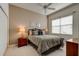 Bedroom with a double bed and large window at 3162 Kailani Ct, Ormond Beach, FL 32174