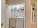 Laundry room with washer, dryer, and shelving at 3162 Kailani Ct, Ormond Beach, FL 32174
