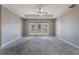 Serene bedroom featuring carpeted floors and ample natural light at 424 Luna Bella Ln # 332, New Smyrna Beach, FL 32168