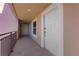 Apartment hallway with tiled floor and white door at 424 Luna Bella Ln # 332, New Smyrna Beach, FL 32168