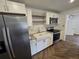 Updated kitchen with farmhouse sink at 432 Sauls St, Ormond Beach, FL 32174