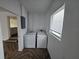 Convenient laundry room with washer and dryer at 432 Sauls St, Ormond Beach, FL 32174