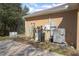 Exterior view of well, water softener, and AC unit at 43747 Choctaw St, Deland, FL 32720