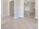 Open living space with tile floors and access to kitchen at 43747 Choctaw St, Deland, FL 32720