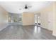 Spacious living room with grey laminate flooring and lots of natural light at 43747 Choctaw St, Deland, FL 32720