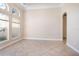 Spacious living room with neutral walls and tile floors at 43747 Choctaw St, Deland, FL 32720