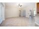 Spacious living room featuring tile flooring and multiple entryways at 43747 Choctaw St, Deland, FL 32720