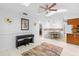 Living room with piano, area rug, and view into dining area and kitchen at 461 Providence Blvd, Deltona, FL 32725