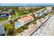 Stunning aerial view of beachfront home with private pool and easy beach access at 4672 Riverwalk Village # 8406, Ponce Inlet, FL 32127