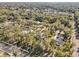 A beautiful property surrounded by mature trees in an established neighborhood provides suburban living at 475 W Main St, Lake Helen, FL 32744