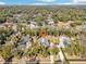 Well-maintained property with mature trees in a desirable community, providing serene suburban living at 475 W Main St, Lake Helen, FL 32744