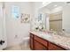 Bathroom with granite countertop, single sink and shower/tub combo at 475 W Main St, Lake Helen, FL 32744