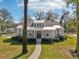 Gray house with a metal roof and walkway at 475 W Main St, Lake Helen, FL 32744