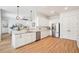 Modern kitchen featuring stainless steel appliances and granite countertops at 475 W Main St, Lake Helen, FL 32744