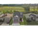 Aerial view of a house and surrounding landscape at 5589 Nw 40Th Loop, Ocala, FL 34482