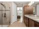 Spa-like bathroom with double vanity, large shower, and plenty of storage at 5589 Nw 40Th Loop, Ocala, FL 34482