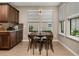 Cozy breakfast nook with round table and four chairs at 5589 Nw 40Th Loop, Ocala, FL 34482