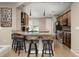 Kitchen with granite counter and breakfast bar seating at 5589 Nw 40Th Loop, Ocala, FL 34482