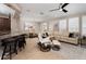 Spacious living room with sectional sofa and large TV at 5589 Nw 40Th Loop, Ocala, FL 34482