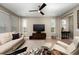 Living area with sectional sofa and hardwood floors at 5589 Nw 40Th Loop, Ocala, FL 34482
