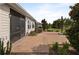 Brick paved patio adjacent to a screened porch at 5589 Nw 40Th Loop, Ocala, FL 34482