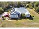 Aerial view of home with solar panels and large backyard at 675 Winterberry Trl, Deland, FL 32724
