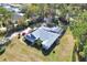Aerial view showcasing home, pool, and expansive lot at 675 Winterberry Trl, Deland, FL 32724