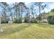 Spacious backyard with shed and lush lawn at 675 Winterberry Trl, Deland, FL 32724