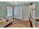 Light and airy bedroom with double doors to closet at 675 Winterberry Trl, Deland, FL 32724