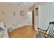 Bedroom with daybed, rocking chair, and access to bath at 675 Winterberry Trl, Deland, FL 32724