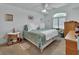 Spacious bedroom with a king-size bed, ample closet space, and neutral decor at 675 Winterberry Trl, Deland, FL 32724