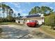 Ranch home with solar panels, garage, and large backyard at 675 Winterberry Trl, Deland, FL 32724