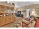 Spacious living area with built-in hutch and hardwood floors at 675 Winterberry Trl, Deland, FL 32724
