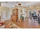 Open living space with a built-in hutch and adjacent office area at 675 Winterberry Trl, Deland, FL 32724