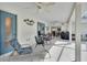 Covered patio with seating area and grill at 675 Winterberry Trl, Deland, FL 32724