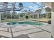 Screened pool and patio area with backyard view at 675 Winterberry Trl, Deland, FL 32724