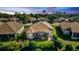 Aerial view of home showcasing a backyard with a screened patio at 676 Newhall Ln, Debary, FL 32713