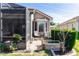 Cozy patio with seating area and raised garden bed at 676 Newhall Ln, Debary, FL 32713