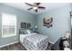 Cozy guest bedroom with double bed and window coverings at 676 Newhall Ln, Debary, FL 32713