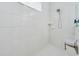 Clean bathroom with a walk-in shower and tile flooring at 6832 Forkmead Ln, Port Orange, FL 32128
