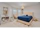 Spacious bedroom with a neutral color palette, plush rug and ample storage at 6832 Forkmead Ln, Port Orange, FL 32128