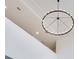 Large circular chandelier with multiple lights, perfect for a two-story foyer at 6832 Forkmead Ln, Port Orange, FL 32128